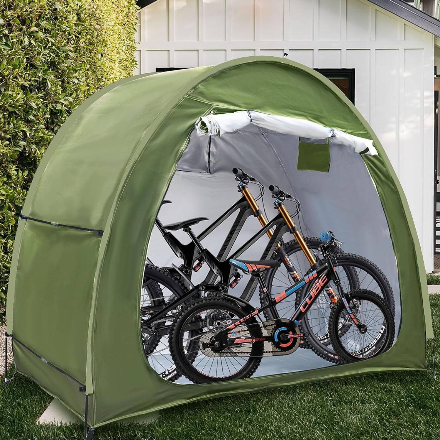 A bike tent sheltering bicycles outdoors